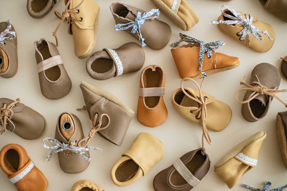 collection of baby boots, Mary janes, and oxfords
