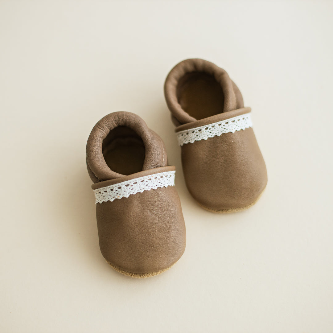 taupe leather baby girl shoes with soft soles and ivory lace trim
