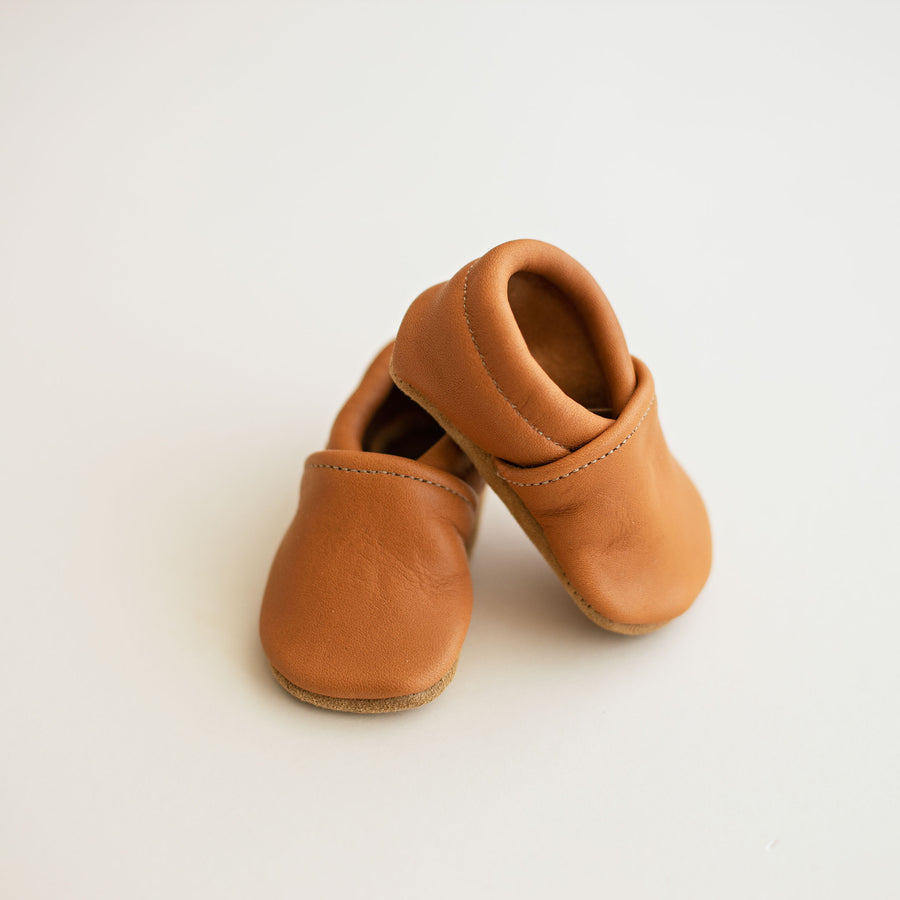 Soft sole gender neutral baby shoes. Ginger color slip-on moccs. Vegetable tanned and made in USA