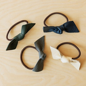 Leather bow ponytail holder