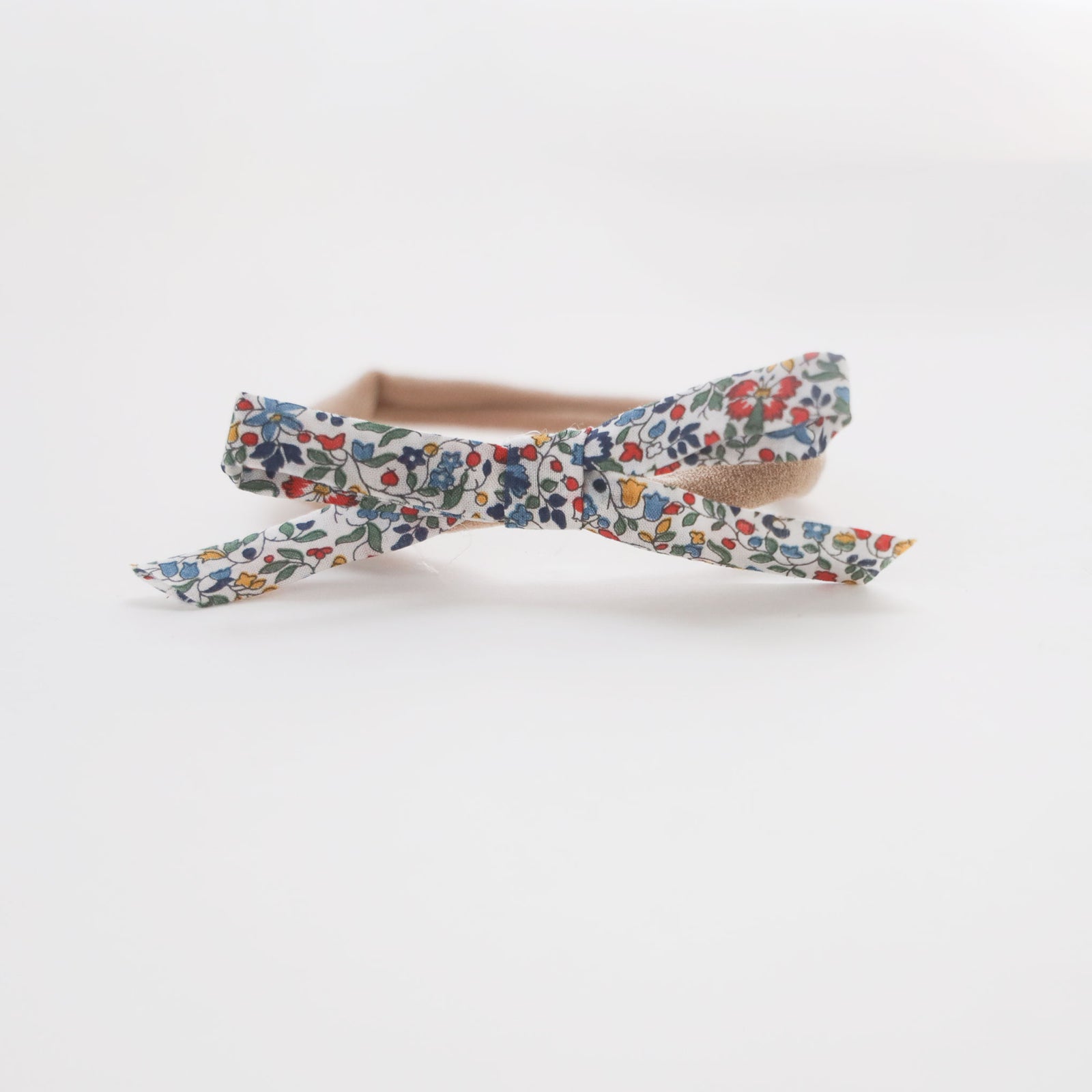 floral baby headband with nylon band. newborn baby headband