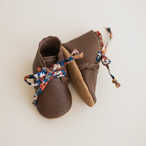 dark brown leather baby  girl boots with scalloped edge. Vegetable tanned leather with floral fabric laces