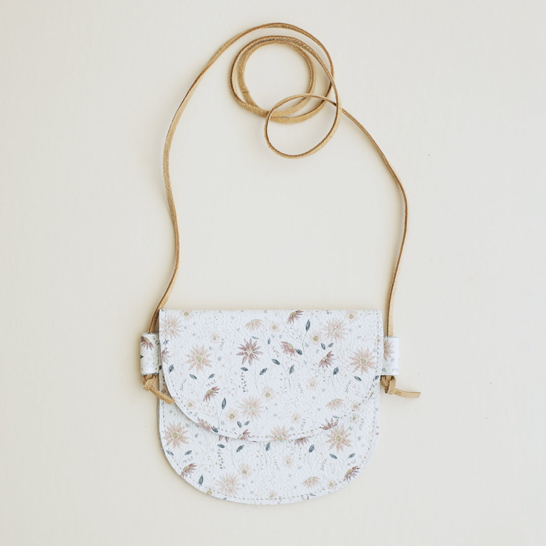 White and pink floral print toddler purse. Genuine leather purse sized for 3 to 7 year olds