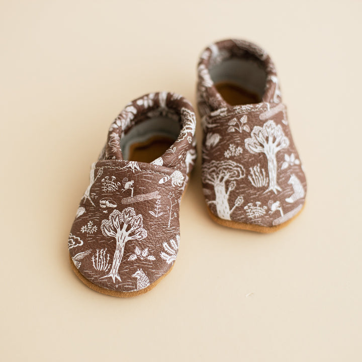 brown forest print baby moccs . gender neutral baby slip on shoes