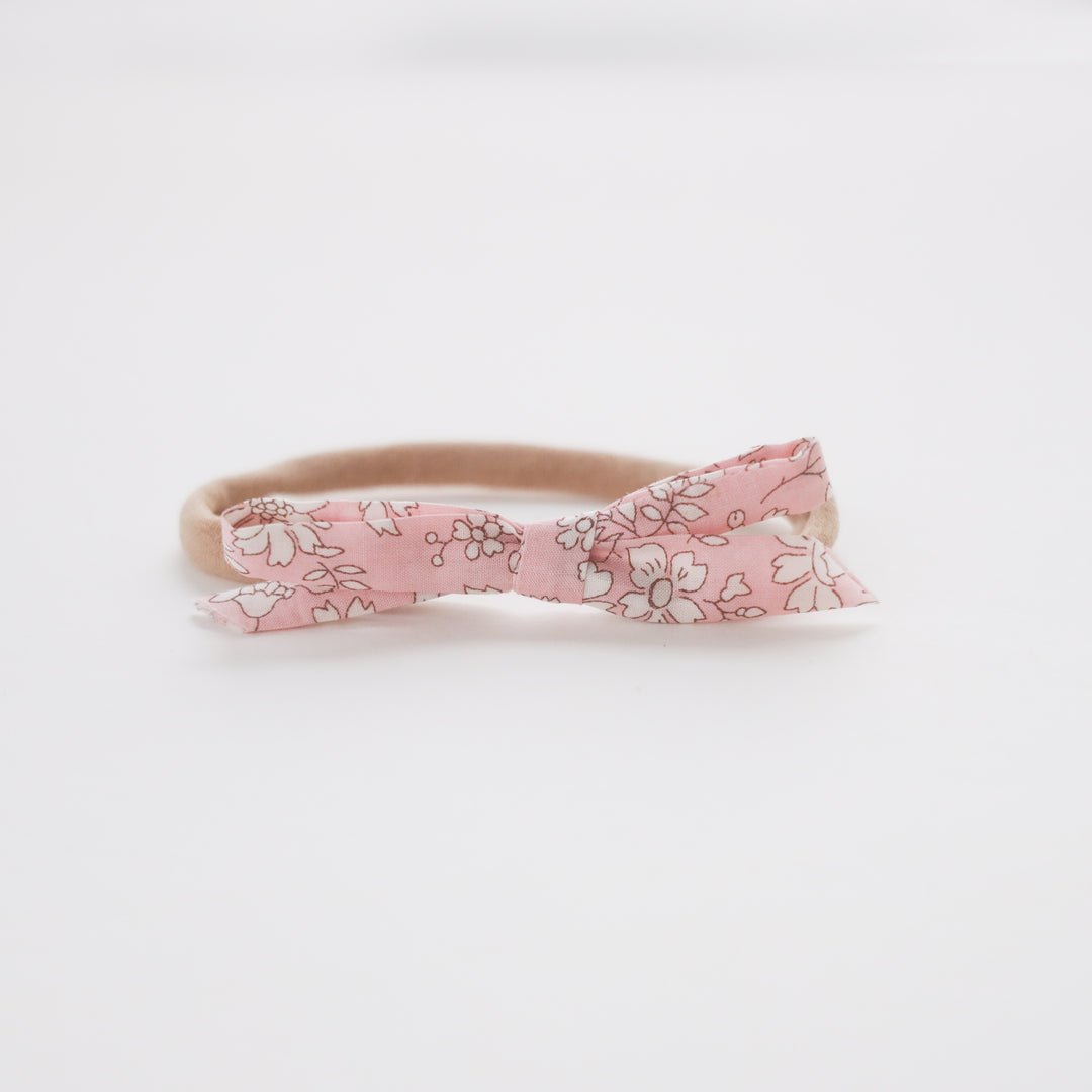 light pink floral baby head band with nylon  band for newborns and babies